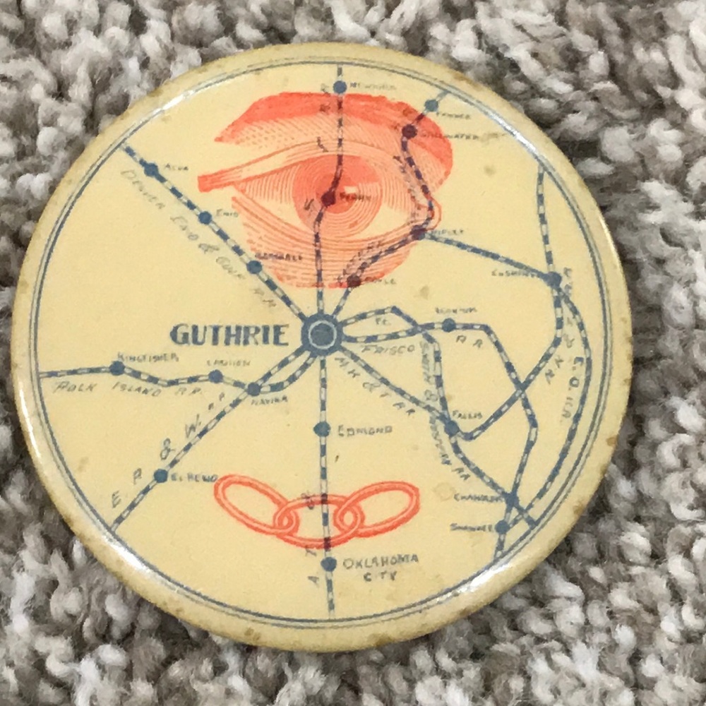 Early Oklahoma IOOF pin with all seeing eye and a map. Circa 1920 +/- 5